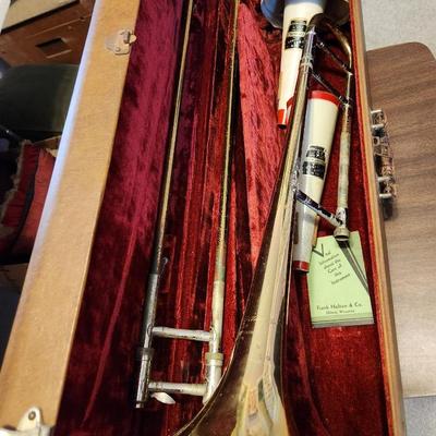 Sale Photo Thumbnail #193: This auction lot is for a Frank Holton & Company Trumpet.  This wonderfully unique musical instrument has seen a few blue notes. The previous owner was in a touring Jazz Band.  It has been stored for at least 40 years.  This trumpet was manufactured by th