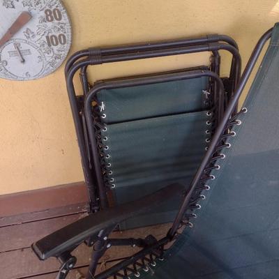 Pair of Matching Gravity Lawn Reclining Chairs