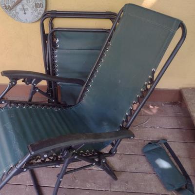 Pair of Matching Gravity Lawn Reclining Chairs