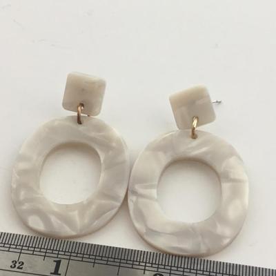 Unmarked white fashion earrings