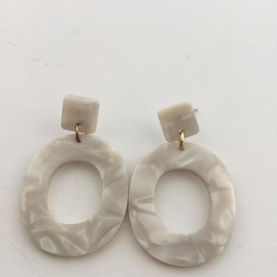 Unmarked white fashion earrings