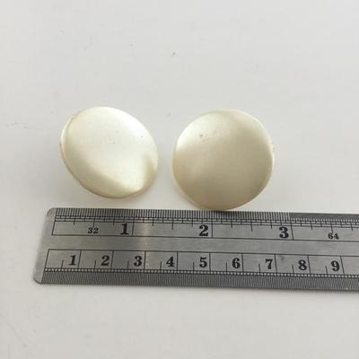 Vintage Cora marked round clip on earrings