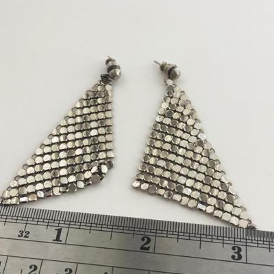 Silver tone statement earrings