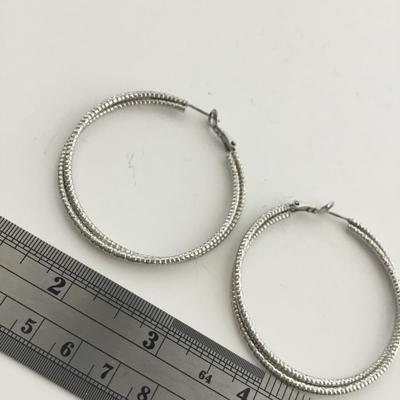 Silver tone hoop earrings