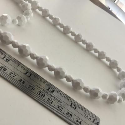 Unmarked white beaded multilayer statement necklace