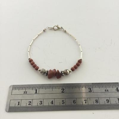 Silver tone brown beaded fashion bracelet