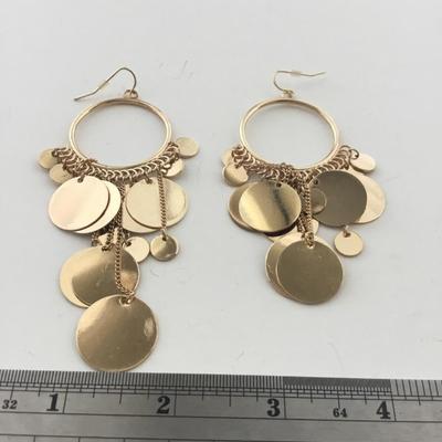 Gold tone dangle statement earrings