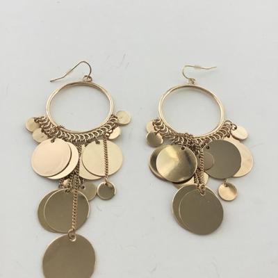 Gold tone dangle statement earrings