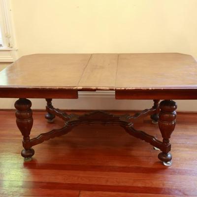 Vintage Dining Table with Carved Base and Center Leaf