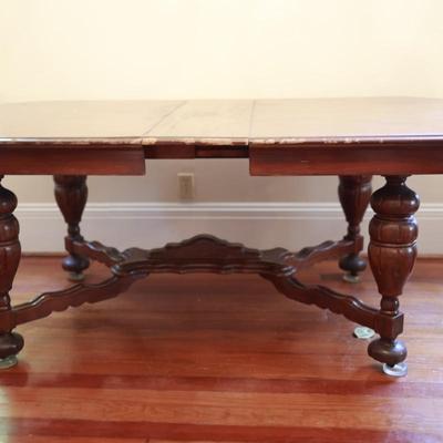 Vintage Dining Table with Carved Base and Center Leaf