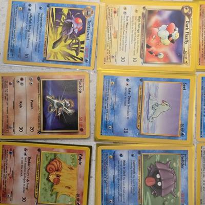 Lot of 14 1st edition pokemon cards