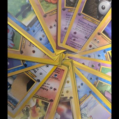 Lot of 14 1st edition pokemon cards