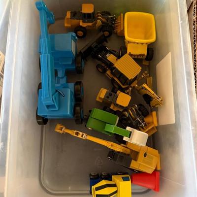 Sale Photo Thumbnail #49: Tractor & Trucks as shown in both plastic tubs