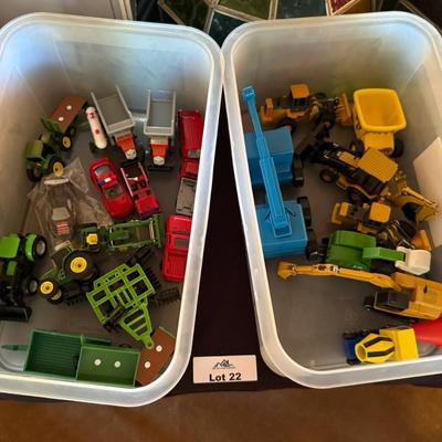 Sale Photo Thumbnail #48: Tractor & Trucks as shown in both plastic tubs