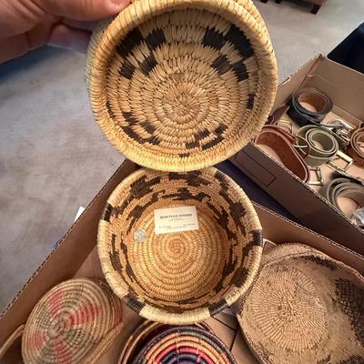 Sale Photo Thumbnail #476: lot of woven native baskets some with lids as shown