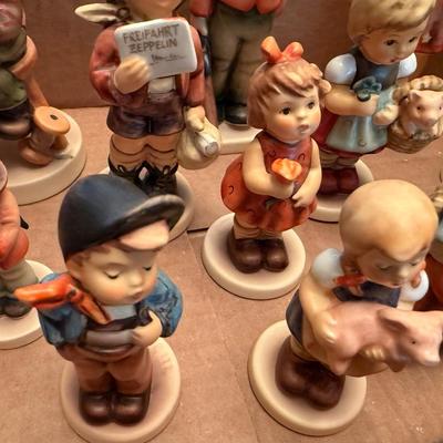 Sale Photo Thumbnail #495: another grouping of loose Hummel Figures/figurines