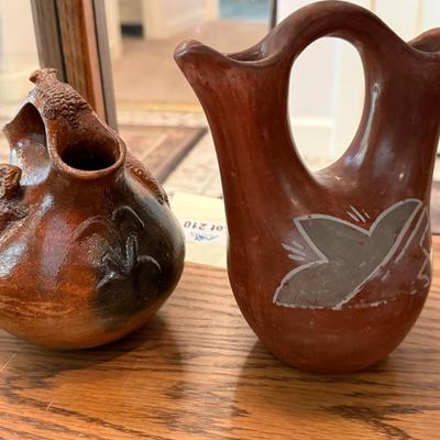 Sale Photo Thumbnail #649: 2 different shaped ceramic Pueblo Wedding Jugs