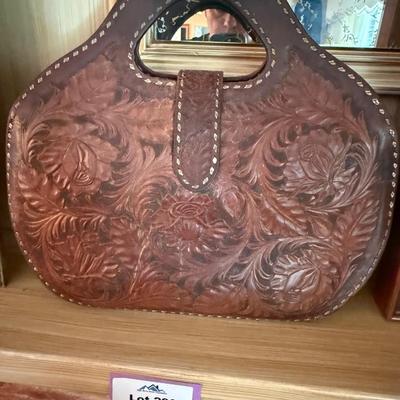 Sale Photo Thumbnail #992: Vtg,. tooled leather Bag w/Sterling Silver buckle
