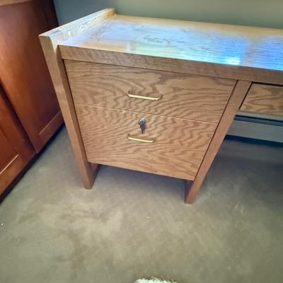 Sale Photo Thumbnail #1102: Oak Wood 66”l x 29”t x 24”d 4 drawer desk 1 locks
