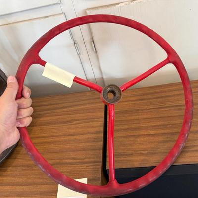 Sale Photo Thumbnail #1165: Red Vintage Metal Steering Wheel that goes to ?
