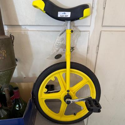 Sale Photo Thumbnail #1184: Unused looking Yellow unbranded Unicycle