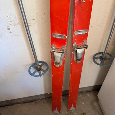 Sale Photo Thumbnail #1244: Pair of Orange & Gray Snow Skis & metal poles