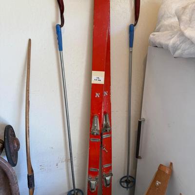 Sale Photo Thumbnail #1242: Pair of Orange & Gray Snow Skis & metal poles