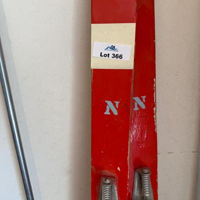 Sale Photo Thumbnail #1243: Pair of Orange & Gray Snow Skis & metal poles