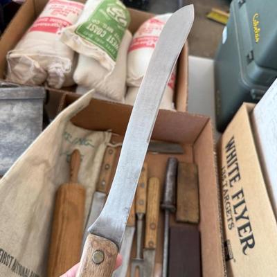 Sale Photo Thumbnail #1304: Box with punch of vintage Knives/Rolling Pin/Stone