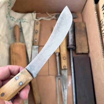 Sale Photo Thumbnail #1305: Box with punch of vintage Knives/Rolling Pin/Stone