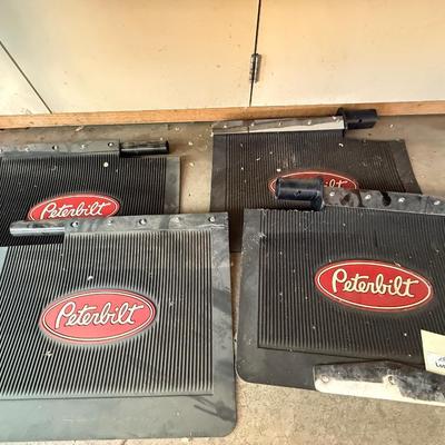 Sale Photo Thumbnail #1378: 2 Sets of Peterbilt Mud Flaps. Appear to be unused