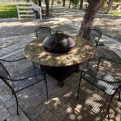 Sale Photo Thumbnail #1403: Nice Gas outdoor Fire pit w/4 Chairs gas is connected. Will need to disconnect,