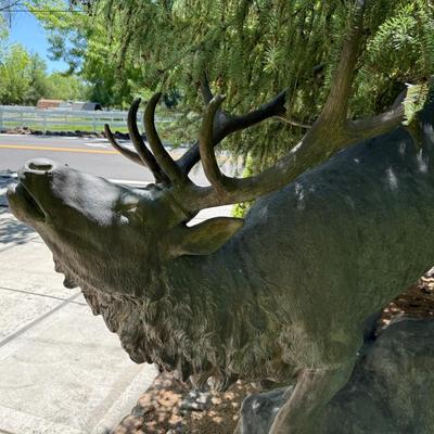 Sale Photo Thumbnail #1419: Bronze Bull Elk Tall Outdoor Statue by S. Gate
This item will require special logistics to remove it from the yard. We are not loading or transporting these large items. They must be removed carefully not to disturb the surroundings.