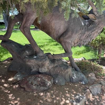 Sale Photo Thumbnail #1421: Bronze Bull Elk Tall Outdoor Statue by S. Gate
This item will require special logistics to remove it from the yard. We are not loading or transporting these large items. They must be removed carefully not to disturb the surroundings.