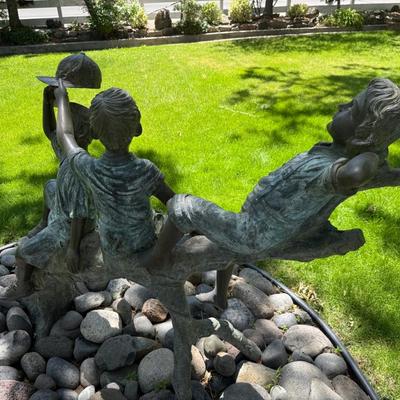Sale Photo Thumbnail #1437: Outdoor Boy themed Bronze 1 w/cap 5’L x 4’t approx
This item will require special logistics to remove it from the yard. We are not loading or transporting these large items. They must be removed carefully not to disturb the surroundings.