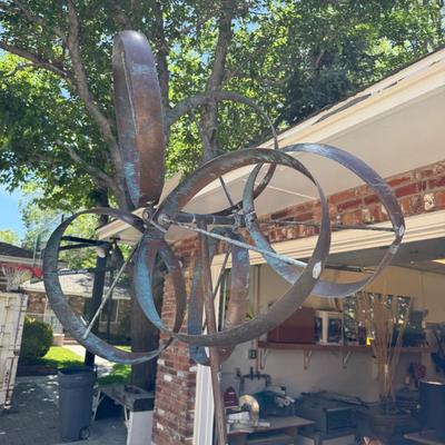 Sale Photo Thumbnail #1455: 8’T Metal/Copper Whirligig Yard Deco w/Stone Base