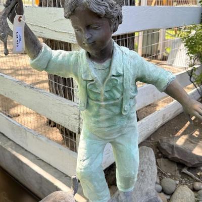 Sale Photo Thumbnail #1459: Cute outdoor Bronze w/2 kids & dog on it 5’l x 5t est.
This item will require special logistics to remove it from the yard. We are not loading or transporting these large items. They must be removed carefully not to disturb the surroundings.