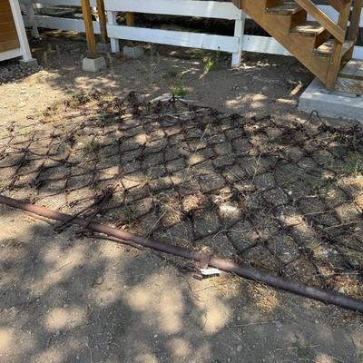 Sale Photo Thumbnail #1464: Cast Iron tractor pulled yard Grader Screens - Large 
This item will require special logistics to remove it from the yard. We are not loading or transporting these large items. They must be removed carefully not to disturb the surroundings.
North end of p