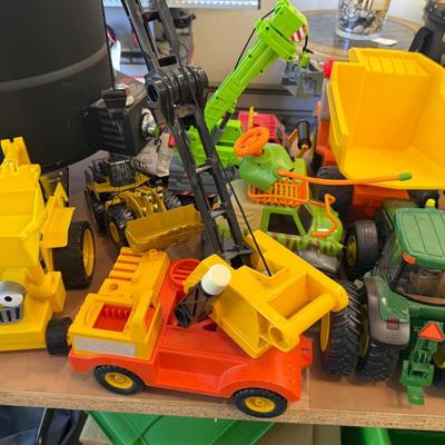Sale Photo Thumbnail #1567: Lots of plastic Toy Tractors & Cranes as shown