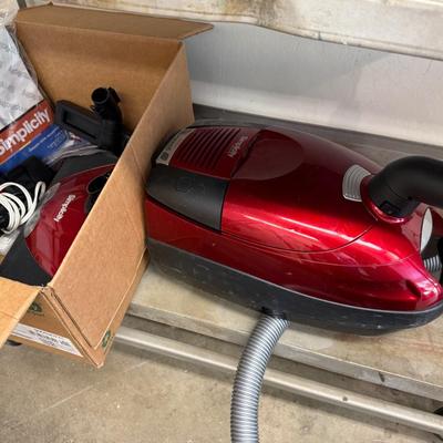 Sale Photo Thumbnail #1616: Simplicity Verve portable Vacuum w/bags & attachm