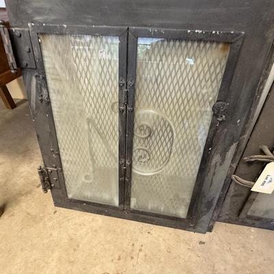 Sale Photo Thumbnail #1691: 2 Black Cast Iron Fireplace Doors 1 w/Horseshoe