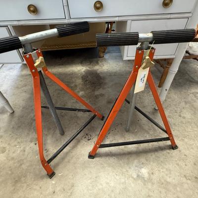 Sale Photo Thumbnail #1701: 2 Metal adjustable wood/lumber cutting stands