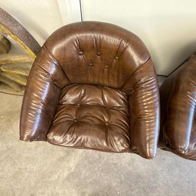 Sale Photo Thumbnail #1713: 2 Brown rolling Club Chairs on Casters as s town