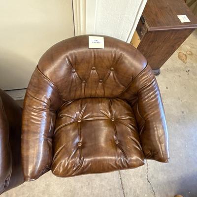 Sale Photo Thumbnail #1712: 2 Brown rolling Club Chairs on Casters as s town