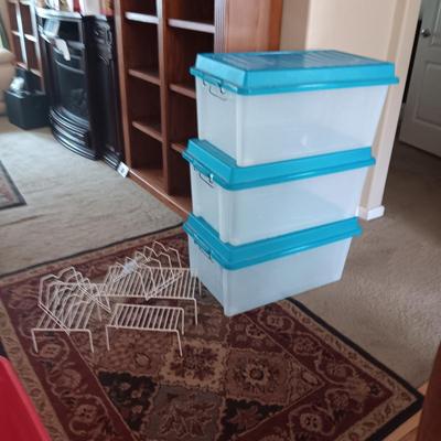 3 LARGER STORAGE TOTES AND SOME CUPBOARD LIFTS