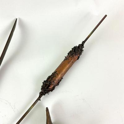 Sale Photo Thumbnail #1379: Comes with nails for display on wall
Measures: 3' 4" high x 19" wide
Late 20th century bronze bird sculpture with rushes and reed titled "Nuthatch" by Georgia Gerber  ; cast of the artist's foundry on Whidbey Island, Washington; wall hung; very good condi