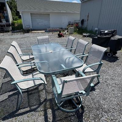 406 Large Outdoor Glass Top Dining Table With 8 Matching Chairs