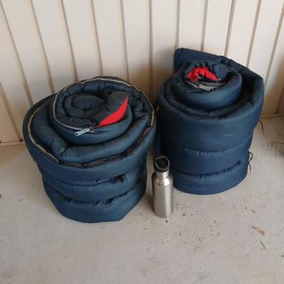 Pair of Vintage Blue Sleeping Bags with Red Interior