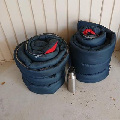 Pair of Vintage Blue Sleeping Bags with Red Interior