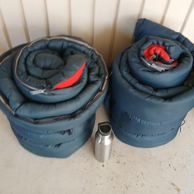 Pair of Vintage Blue Sleeping Bags with Red Interior